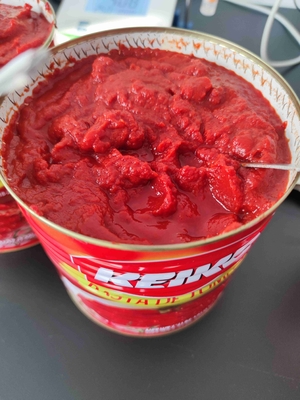 Tomatenpasta in blik met opslaginstructies Bewaren in koelen toestellen Geen additieven Geen kunstmatige conserveringsmiddelen
