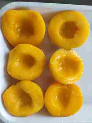 Geconserveerde perziken geen conserveermiddelen alleen natuurlijke vruchten